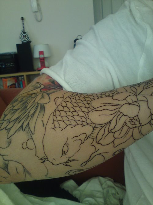 Not only one of the very beautiful and sexy tattoo designs Koi Fish Tattoo