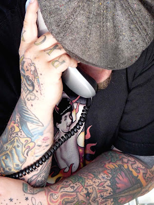 He was on the phone at a Venice beach tattoo shop. He was on the phone at a Venice beach tattoo shop.