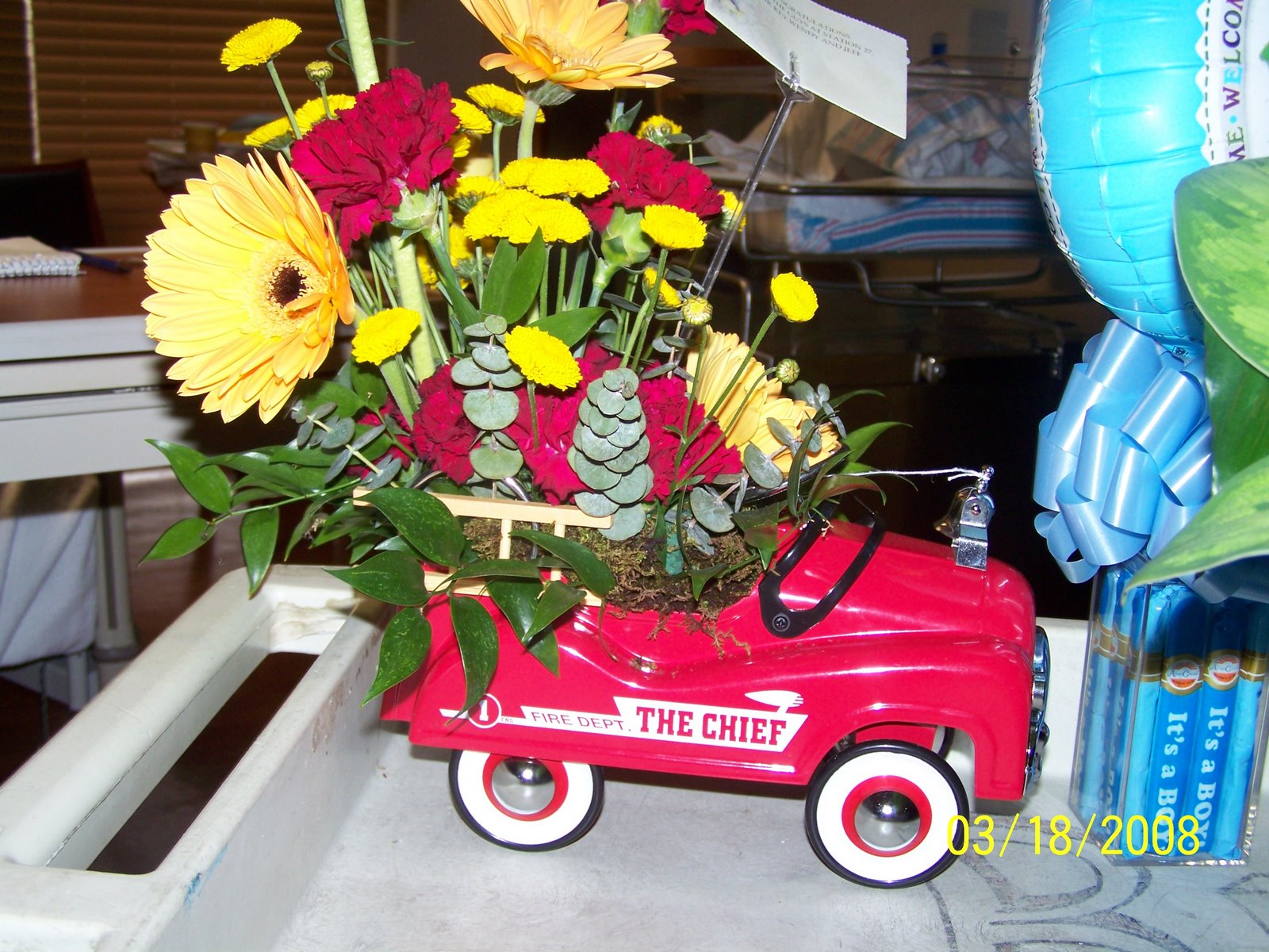 [flowers+from+st+27+fire+engine.JPG]