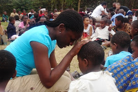 Prayer with one of the little girls at the children's outreach...Summer 2008