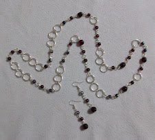Collar 2244 Cristales guindas y uva con argollas bañadas en plata
