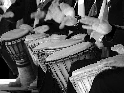 Djembe Drum Circle people playing djembes