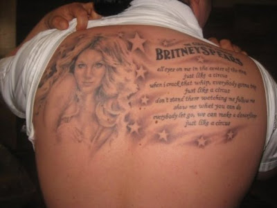  tattoo for the pop star including a portrait and the lyrics to Circus: