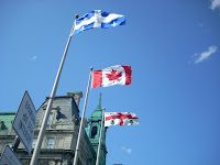 Las banderas de Québec, Canadá y Montreal juntas