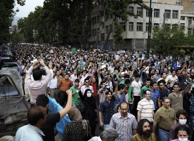 Ahmadinejad defiant on 'free' Iran poll
