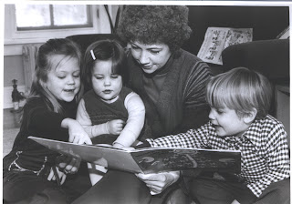 mom and kids reading