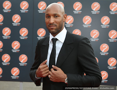 Nicolas Anelka in suit picture