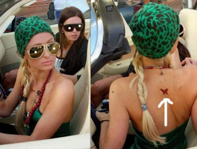 Paris Hilton has also been seen with a butterfly tattoo located in the 