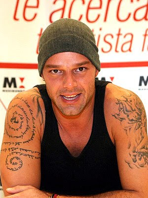 Enjoy these pictures of Ricky Martin and his interesting tattoos.