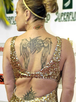 http://4.bp.blogspot.com/_bQ0SqifjNcg/S10vXGgE7EI/AAAAAAAAOJo/h6mZktPpJV8/s400/anastacia-tattoo-3.jpg