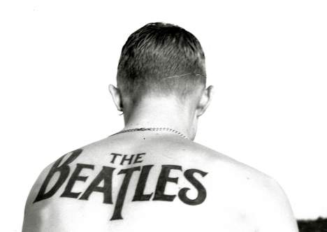 Checkout this super cool photo gallery of Beatles tattoos.