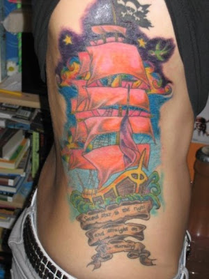 Pirate ship tattoo with skull and crossbones.