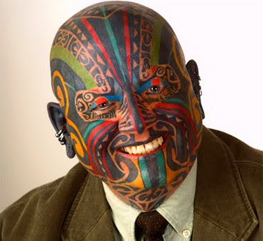 Colorful face tattoo. Colorful face tattoo.