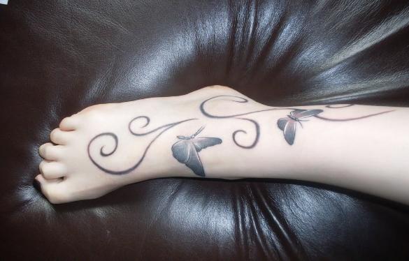 tattos for girls on leg. Beautiful butterfly ankle and foot tattoo idea.