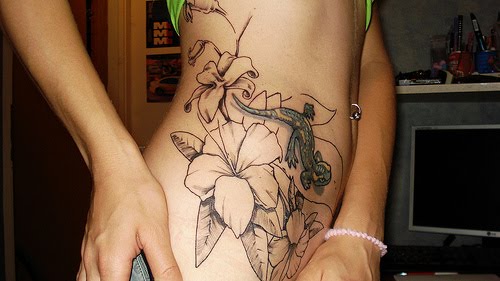 Flower Tattoo With Vines. Flower Hip Tattoo Designs