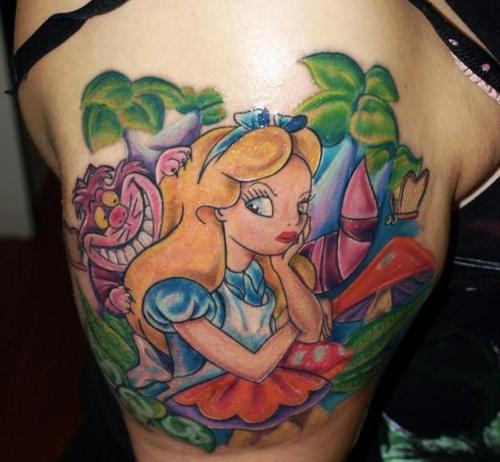 Alice with Cheshire Cat tattoo on right shoulder.