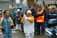 as a torch bearer at Torino Olympic