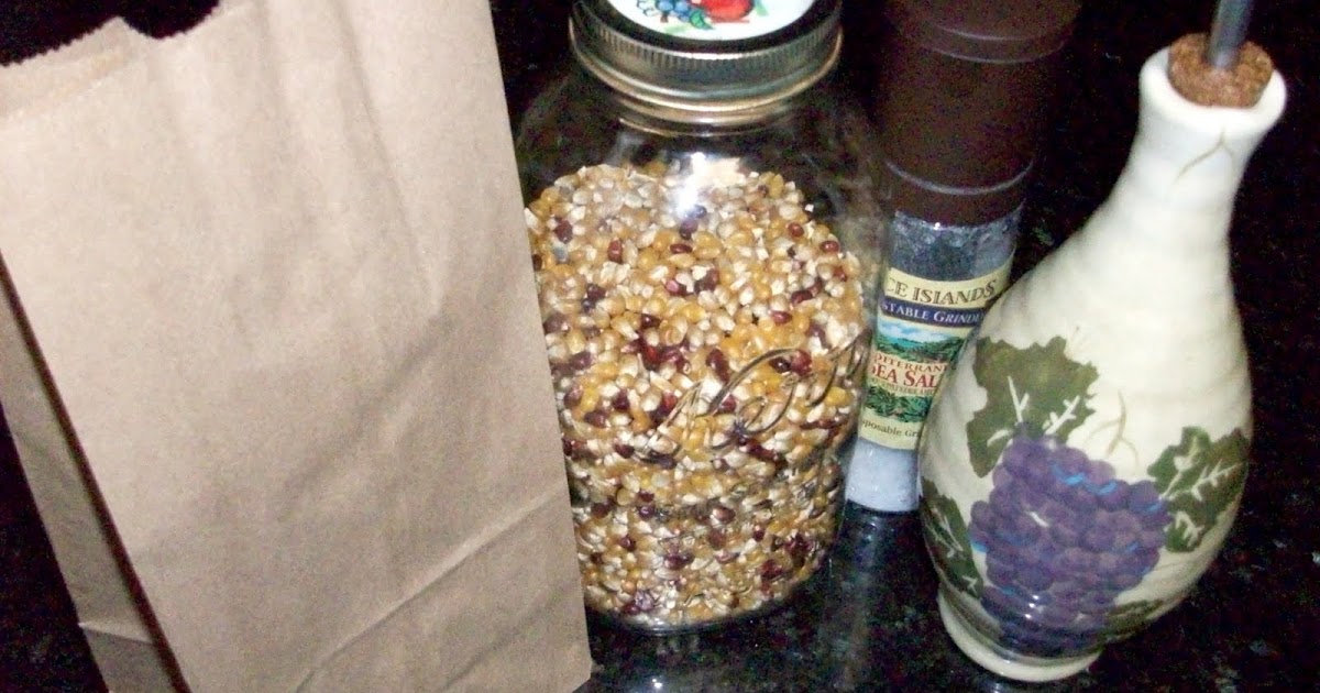 Homestead Roots Homemade Microwavable Popcorn with a brown paper bag