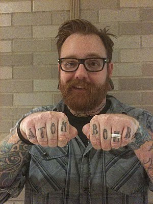 Pearson Pulled from Weekend Delta Flight for 'Atom Bomb' Knuckle Tattoo Pearson Pulled from Weekend Delta Flight for 'Atom Bomb' Knuckle Tattoo