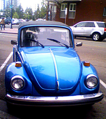 Blue Convertible V. W. Beetle with Karrman Logo Blue Convertible V. W. Beetle with Karrman Logo