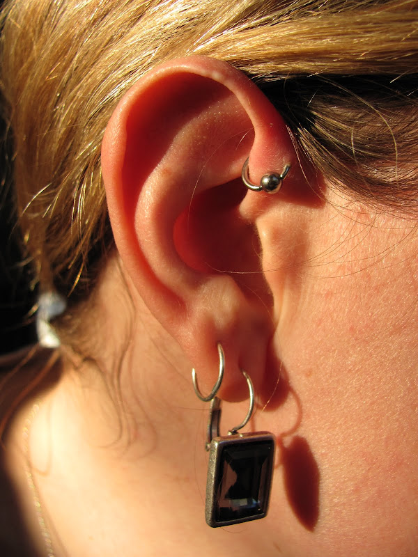 wanted a new funky ear piercing and I like the cute wee ring. title=