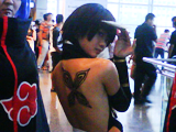 SoiFon from Bleach! I hate the character but this cosplay was nice. Sad, she's missing the two braids.