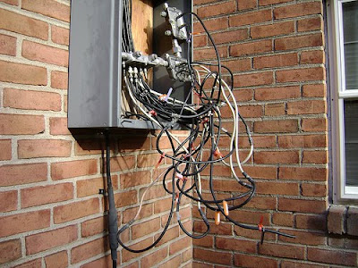 a bunch of Comcast cables in a total mess