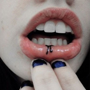 lip tattoos, tattooing
