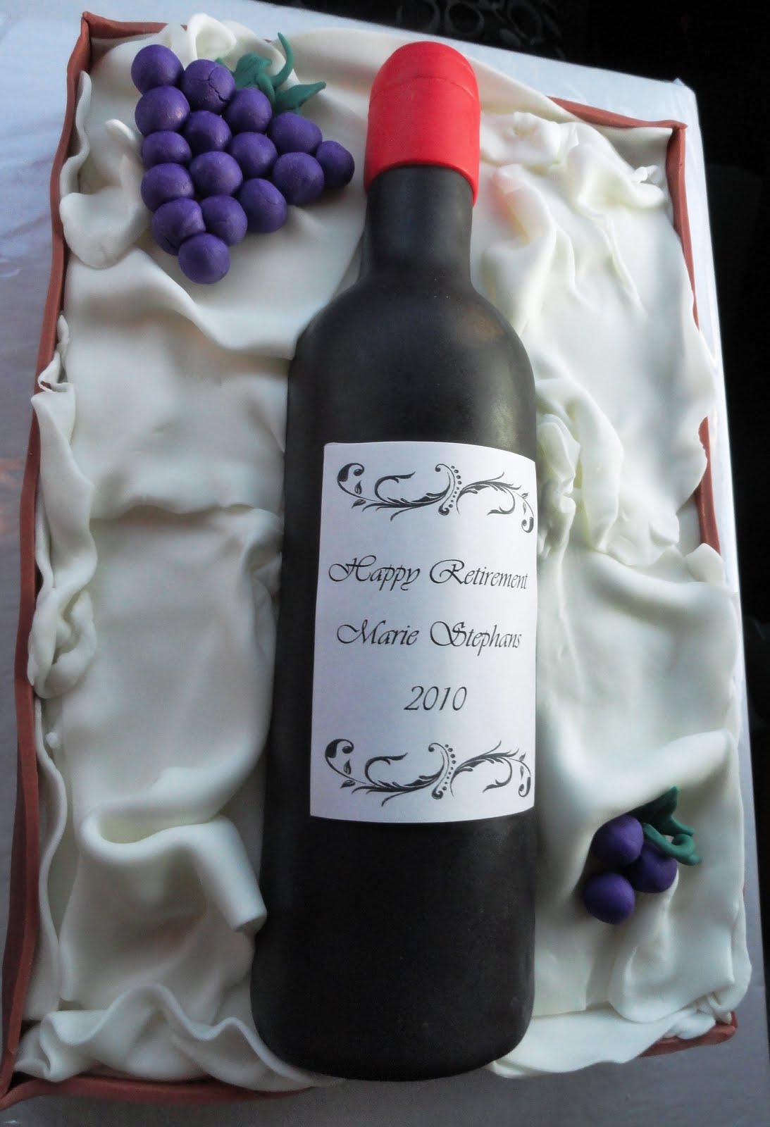 S and J Delights Wine Bottle Cake