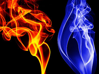 Orange and blue fire flames on the black