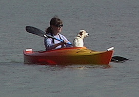 Rosy and Angel in a Canoe