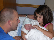 Haven holding Heston for the first time