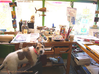 studio Muse at drawing table