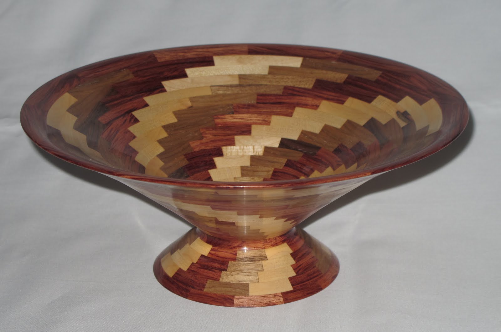 Segmented Wooden Vases & Bowls Segmented Maple, Walnut & Burbinga bowl.