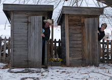 Chris and I in outhouses