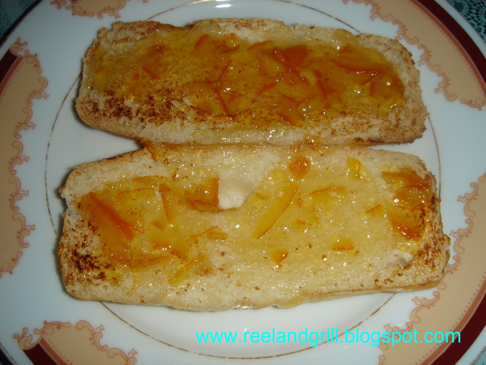 Reel and Grill Sausage Sandwich with Cheese and Orange Marmalade