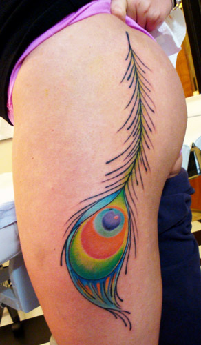 I've never seen a peacock feather tattoo and this