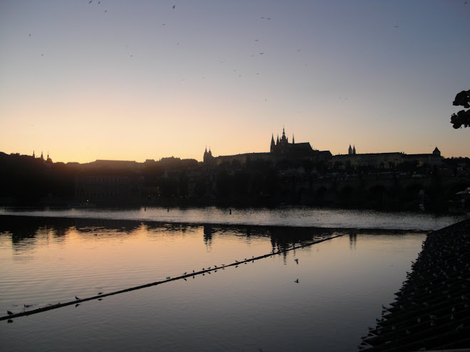 prague castle from afar at dusk