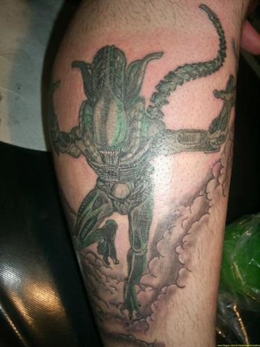 3D Alien Tattoo on Biceps 3D Alien Tattoo on Biceps