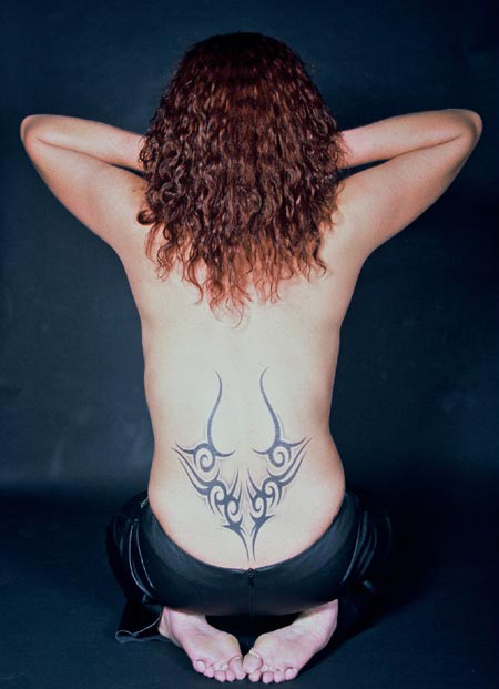 This tribal tattoo design is shaped like horns and provides some uniqueness 