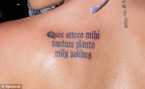 Alyssa Milano shoulder tattoo.