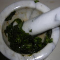 Fresh basil in pestle