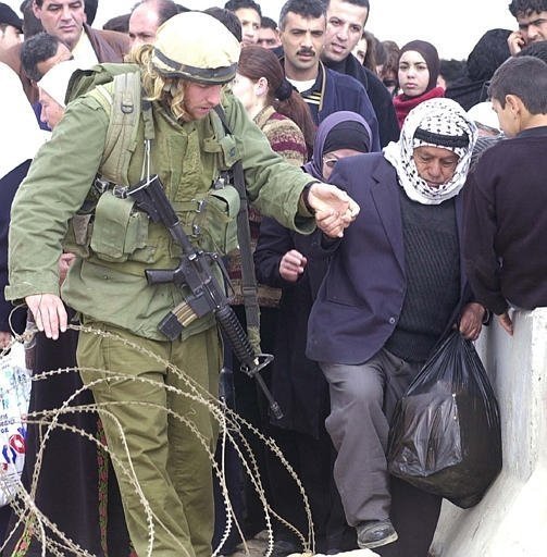 [Israeli+soldier+giving+a+hand+to+a+Palestinian+elderly.jpg"&gt]