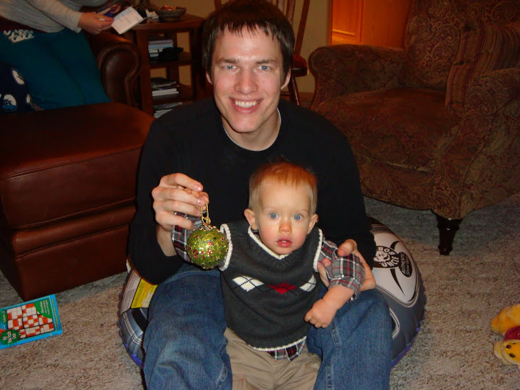 Bjorn and Leif with his homemade ornament from Grandma.