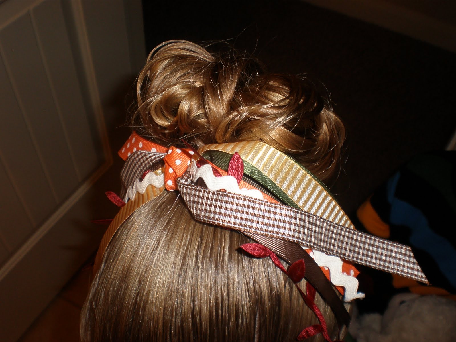 Girl Hairdos & Ideas messy bun...for the longer & thicker hair