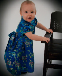 Here I am in my little Asian style dress.  28Dec09