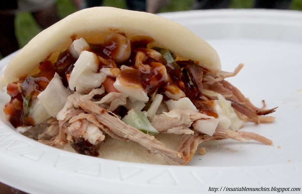Pulled pork sandwiches encased in chinese buns