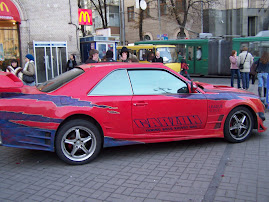The multi-red car...