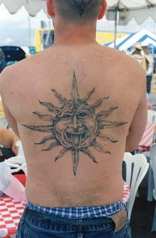It's a pretty close rendition of Charisma's sun tattoo. It's a pretty close rendition of Charisma's sun tattoo.