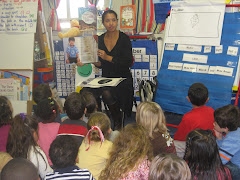 Nina Crew Showing Class a Picture of Mrs. Graham's Block